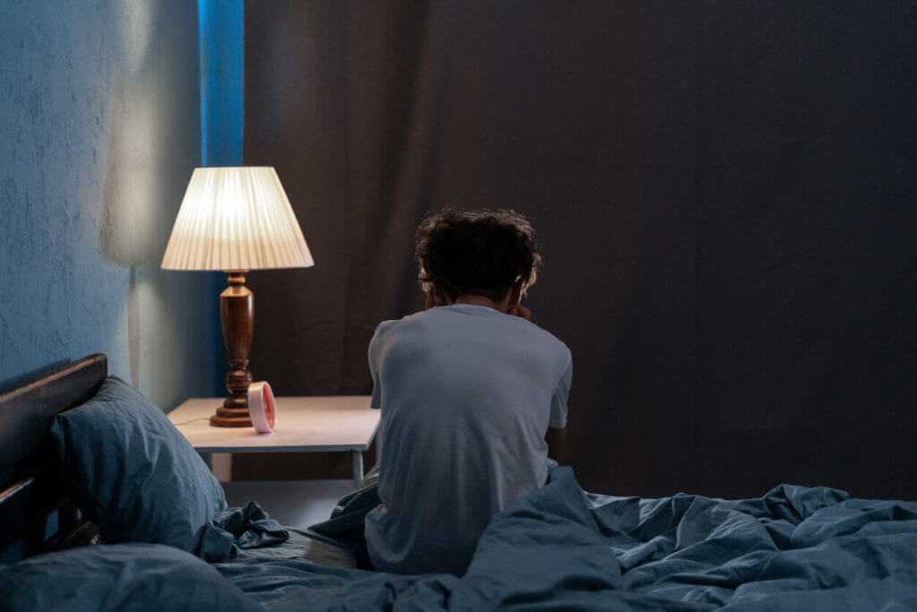 man suffering from insomnia